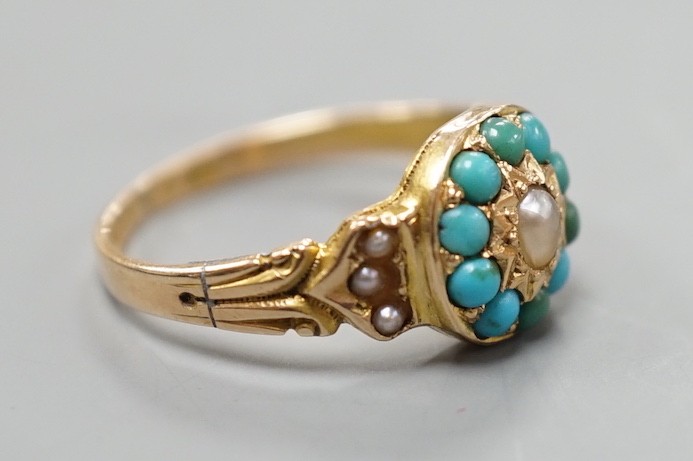 A George V 15ct gold, turquoise and split pearl set cluster ring, size K, gross weight 3 grams.